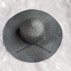 Straw like floppy sun hat with faux leather tie detail